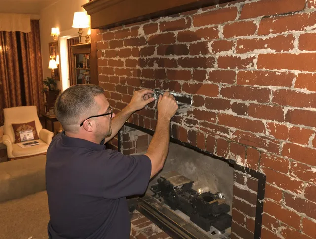 Doral Chimney Sweep expert fixing a fireplace in Doral, FL